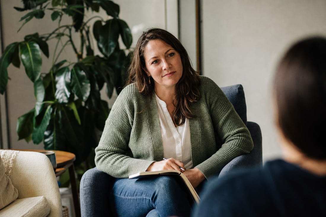 A therapist in her warm counseling office